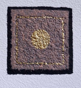 Safe and Sound Embossed collage with gold leaf