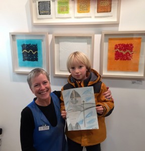 Gill and young artist with "Viking Seal on a Rock"